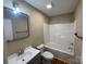 Cozy bathroom showcasing a tub-shower combo, vanity with sink, and modern fixtures at 112 Gilliatt St # 1, Shelby, NC 28150