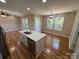 Well-lit kitchen with stainless steel appliances and a view to the backyard at 112 Gilliatt St # 1, Shelby, NC 28150