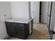 Bathroom featuring a vanity with dark wood cabinet, marble countertop, and modern fixtures at 118 Still Creek Dr, Mooresville, NC 28115