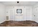 Bright living room features hardwood floors, white trim, and a decorative fireplace at 1224 Hollywood Ter, Albemarle, NC 28001
