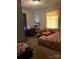 Modest bedroom with comfortable sleeping quarters that features carpeted floors and neutral wall paint at 124 Powder Sw St, Concord, NC 28025