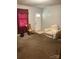 Inviting living room features a cozy seating area and a front door view at 124 Powder Sw St, Concord, NC 28025