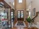Grand foyer with soaring ceilings and elegant hardwood floors at 1377 Shinnecock Ln, Fort Mill, SC 29707