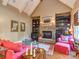 Inviting living room with stone fireplace and built-in bookshelves at 1377 Shinnecock Ln, Fort Mill, SC 29707