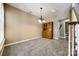 Bright dining area with ample space, carpeted floor, and a wooden hutch at 13916 Mallard Lake Rd, Charlotte, NC 28262