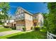 A delightful two-story home boasting stone accents and a well-manicured lawn at 13916 Mallard Lake Rd, Charlotte, NC 28262