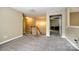 Loft with carpet floors, neutral paint, natural light and staircase at 13916 Mallard Lake Rd, Charlotte, NC 28262