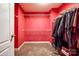 Spacious walk-in closet with ample shelving and carpeted floor at 13916 Mallard Lake Rd, Charlotte, NC 28262