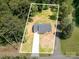 An aerial perspective highlights the property lines, roof and location at 157 Fraley Rd, Gastonia, NC 28052