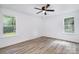 Bright bedroom featuring natural light, two windows and light walls at 157 Fraley Rd, Gastonia, NC 28052