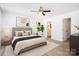 Stylishly decorated bedroom featuring a comfortable bed and ensuite bathroom access at 157 Fraley Rd, Gastonia, NC 28052