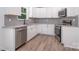 Modern kitchen featuring stainless steel appliances, granite countertops, and stylish backsplash at 157 Fraley Rd, Gastonia, NC 28052