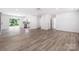 Open-concept living area with sliding glass door access, seamlessly connecting indoor and outdoor living at 157 Fraley Rd, Gastonia, NC 28052