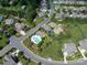 A community pool and playground are nestled in a residential area with sidewalks and well-maintained landscaping at 16016 Reynolds Dr, Fort Mill, SC 29707