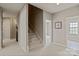 Hallway featuring stairs and doorways to other rooms at 16016 Reynolds Dr, Fort Mill, SC 29707