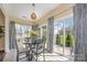 Eat-in-kitchen area with breakfast table, chairs, and sliding glass doors to the outside at 16260 Raven Crest Dr, Indian Land, SC 29707