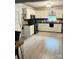 Bright kitchen with white cabinets, modern appliances, and stylish backsplash and countertops at 169 Smith Clemmer Rd, Mount Holly, NC 28120