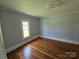 Cozy bedroom with hardwood floors and natural light at 1704 16Th Ne St, Hickory, NC 28601
