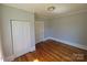 Bedroom with hardwood floors and closet at 1704 16Th Ne St, Hickory, NC 28601