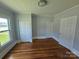 Bedroom with hardwood floors, closet, and natural light at 1704 16Th Ne St, Hickory, NC 28601