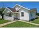Well-maintained home featuring a cozy front porch and a neatly landscaped yard at 1704 16Th Ne St, Hickory, NC 28601