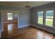 Bright living room with hardwood floors and large windows at 1704 16Th Ne St, Hickory, NC 28601