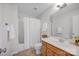This bathroom features a shower with tub, and a single sink vanity at 2117 Copperplate Rd, Charlotte, NC 28262