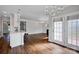 Open-concept living space with hardwood floors and lots of natural light at 2117 Copperplate Rd, Charlotte, NC 28262