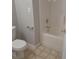 Clean bathroom with a standard toilet, and a shower-tub combo, creating a functional space at 2150 Winthrop Chase Dr, Charlotte, NC 28212