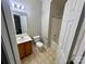 A bathroom featuring a vanity with storage, a toilet, and a shower-tub combo for all your bathing needs at 2150 Winthrop Chase Dr, Charlotte, NC 28212