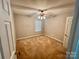 This bedroom features carpet, ceiling fan and a window at 2150 Winthrop Chase Dr, Charlotte, NC 28212