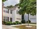 Attractive two-story house featuring an attached garage and manicured landscaping at 2150 Winthrop Chase Dr, Charlotte, NC 28212