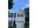 Charming two-story home featuring a neutral facade, attached garage and landscaped front yard at 2150 Winthrop Chase Dr, Charlotte, NC 28212