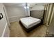 Comfortable main bedroom featuring a spacious layout with neutral colors, a ceiling fan and plush carpeting at 2150 Winthrop Chase Dr, Charlotte, NC 28212