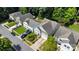 Aerial view of the property showing its location in a residential neighborhood surrounded by mature trees at 2926 Royal Fern Ln, Charlotte, NC 28215