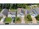Aerial view of the property showcasing the landscaping and neighborhood with tree-lined streets at 2926 Royal Fern Ln, Charlotte, NC 28215