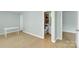 Bathroom showcasing a toilet, vanity with sink, and a glimpse into a shower at 2926 Royal Fern Ln, Charlotte, NC 28215