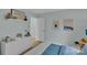Inviting bedroom with decor, light blue walls, wood-look flooring, and white dresser at 2926 Royal Fern Ln, Charlotte, NC 28215