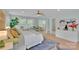 Spacious bedroom with a large bed, ample natural light, and stylish decor at 2926 Royal Fern Ln, Charlotte, NC 28215