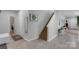 Entry foyer with staircase, neutral paint, and access to multiple rooms at 2926 Royal Fern Ln, Charlotte, NC 28215