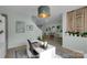 Home office featuring bright light, white furniture, decor and sightlines to other rooms at 2926 Royal Fern Ln, Charlotte, NC 28215