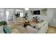Inviting living room featuring a comfortable sofa, stylish decor, and light wood flooring at 2926 Royal Fern Ln, Charlotte, NC 28215