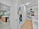 Functional mud room next to kitchen and pantry with shelving at 2926 Royal Fern Ln, Charlotte, NC 28215