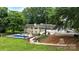 Aerial view of backyard, pool, firepit, and home at 3127 N Center St, Hickory, NC 28601
