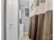 Bathroom featuring a shower with a curtain and a vanity with storage at 3127 N Center St, Hickory, NC 28601