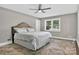 Cozy bedroom with a ceiling fan and a window offering natural light at 3127 N Center St, Hickory, NC 28601