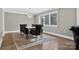 Dining room with modern chandelier, rug, and elegant table set with six chairs at 3127 N Center St, Hickory, NC 28601