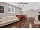 Comfortable living room featuring a couch, booth seating, herringbone floors, and a fireplace at 3127 N Center St, Hickory, NC 28601