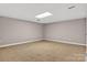 Empty room with tile flooring and ample space for customization at 3127 N Center St, Hickory, NC 28601