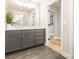 Bathroom view featuring the vanity with double sinks and a large mirror at 3227 Cape Fox Ct, Denver, NC 28037